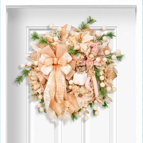 Christmas 28" glam wreath with a whimsical decorative elf, plush package, velvet poinsettias, ball sprays, and evergreens. W21106A