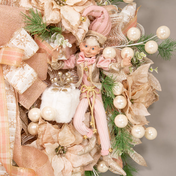 Christmas 28" glam wreath with a whimsical decorative elf, plush package, velvet poinsettias, ball sprays, and evergreens. W21106A