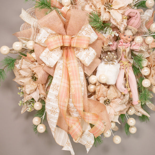 Christmas 28" glam wreath with a whimsical decorative elf, plush package, velvet poinsettias, ball sprays, and evergreens. W21106A