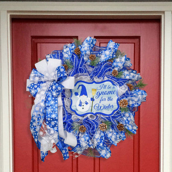 Gnome snowman wreath 26" blue and white with snow flocked pine sprigs and real pine cones. For door or wall. W21117A