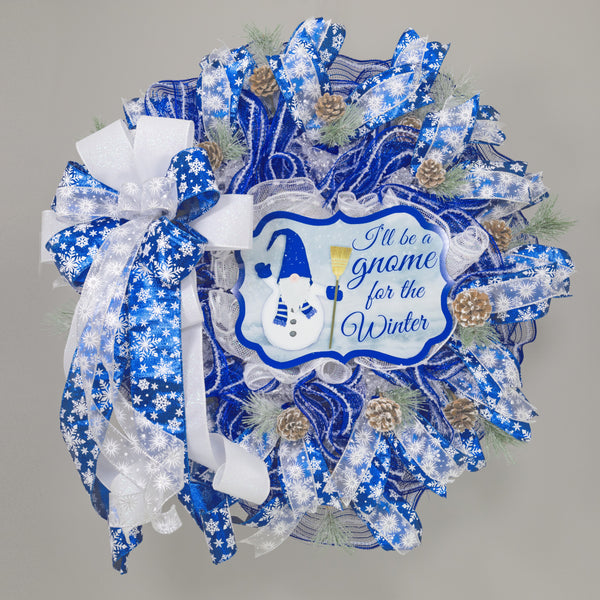 Gnome snowman wreath 26" blue and white with snow flocked pine sprigs and real pine cones. For door or wall. W21117A