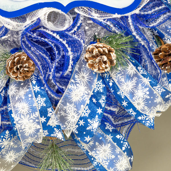 Gnome snowman wreath 26" blue and white with snow flocked pine sprigs and real pine cones. For door or wall. W21117A